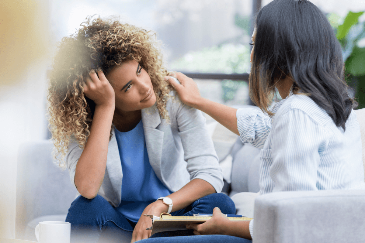 Therapist supporting a client in co-occurring disorder treatment